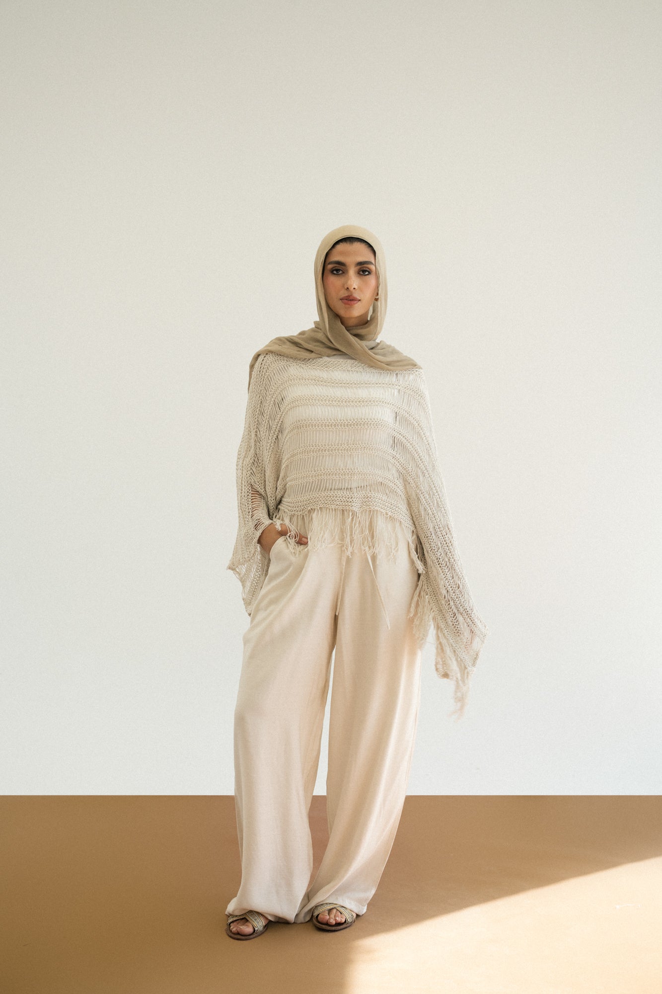 Cape-Style Knit Blouse in Offwhite