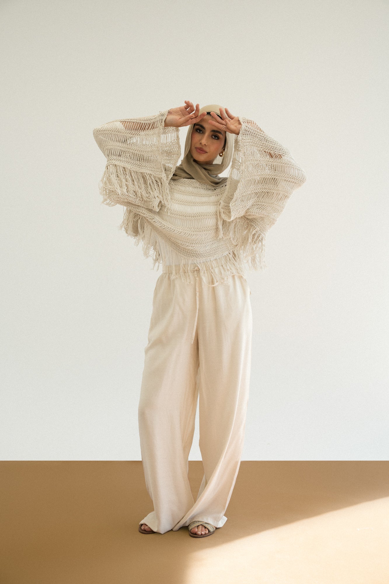 Cape-Style Knit Blouse in Offwhite