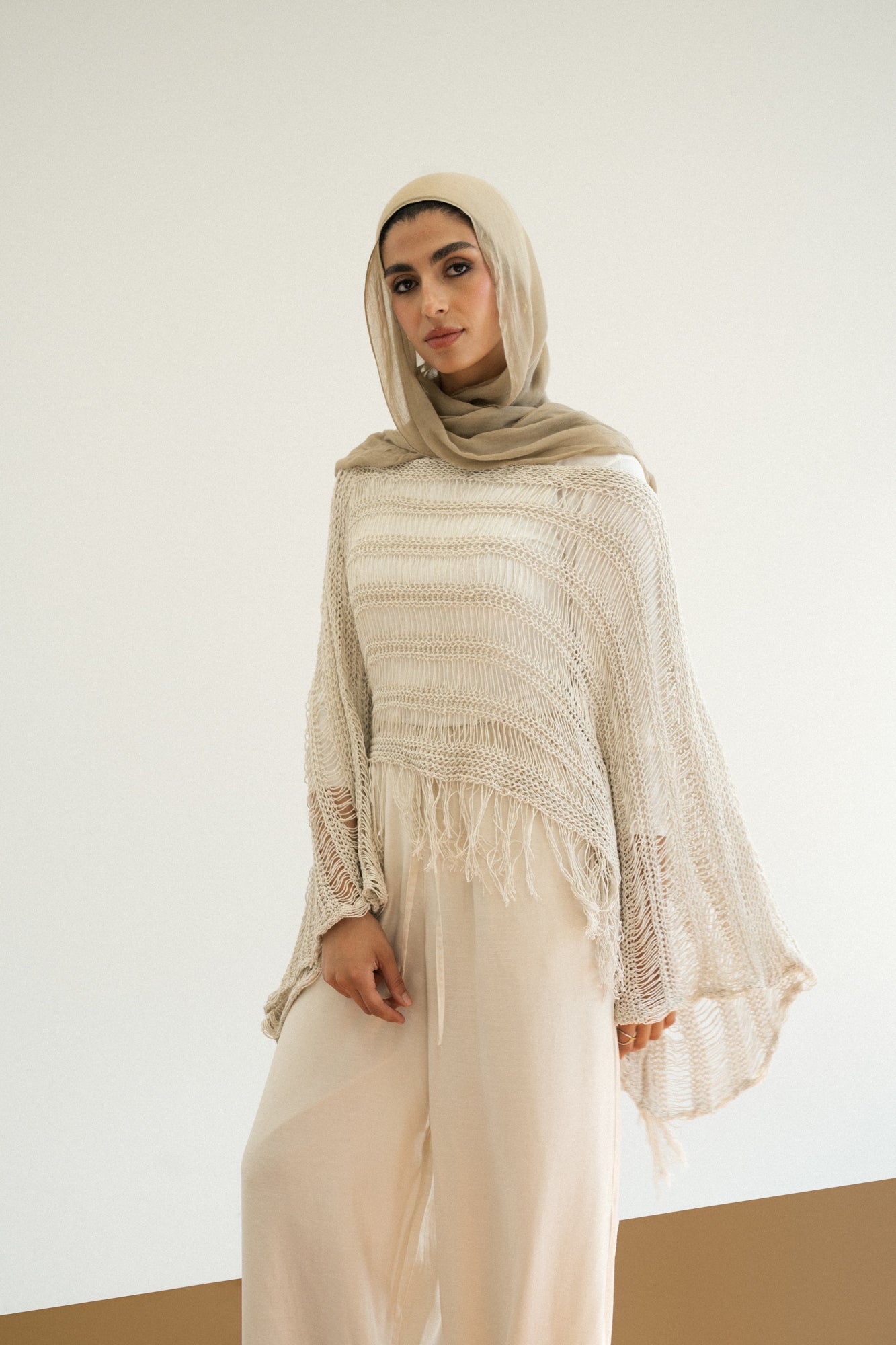 Cape-Style Knit Blouse in Offwhite